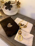 Petite pochette moumoute