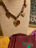 Collier léopard rouge multi cœurs dores