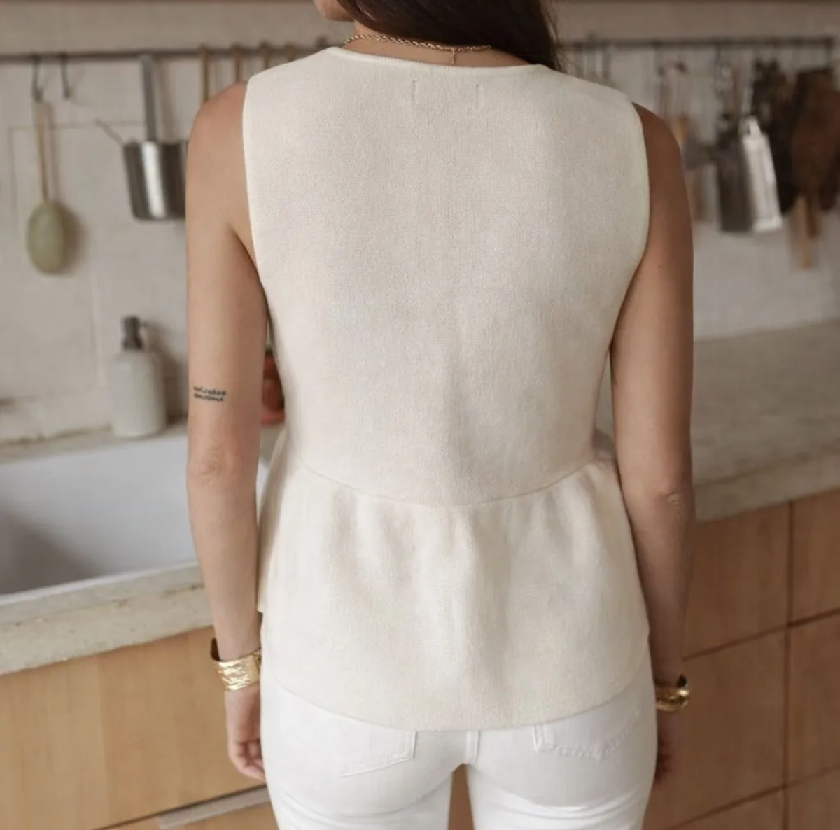 GILET sans manches à basque peplum